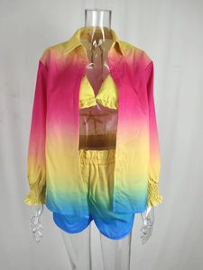 Detail of three-piece gradient beach set showing long sleeve shirt and bikini top textures