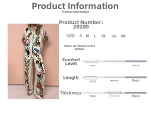 Detail of vintage tropical floral print on a two-piece wide-leg trousers and shirt set