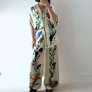 Women's 2-piece cream set with artistic floral print, shirt and wide-leg trousers