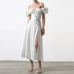 Elegant white off-shoulder maxi dress with puff sleeves, drawstring front and high slit