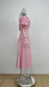 Detailed side view of pink puff sleeve dress with elastic off-shoulder neckline