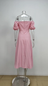 Detail view of the pink off-shoulder midi dress featuring a back invisible zipper closure