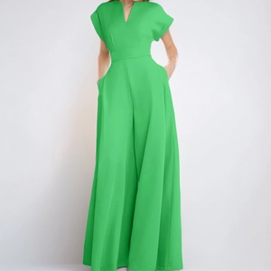 Women's green V-neck short sleeve jumpsuit with high waist and wide leg silhouette