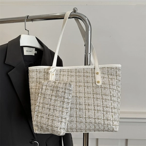 Elegant white tweed tote bag with gold metallic threads and matching small pouch