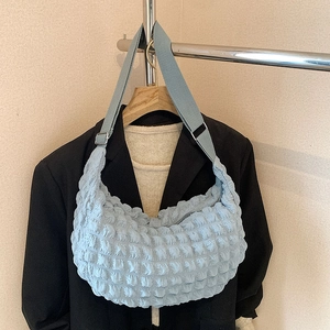 Light blue bubble pleated hobo bag with adjustable wide strap for casual wear