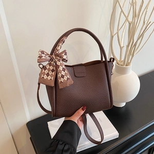 Brown litchi grain bucket bag with silk scarf bow and gold fashion magnetic buckle