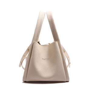 Creamy white lychee grain leather tote bag with Fashion print and gold hardware