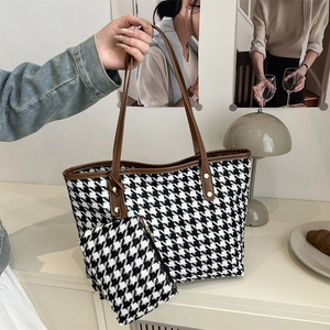 Classic houndstooth tote bag with brown leather handles and matching coin purse