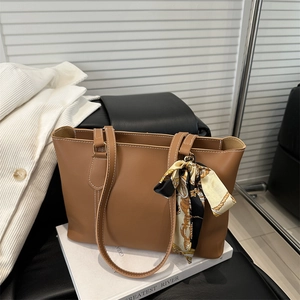 Brown large capacity soft leather tote bag with white stitching and floral silk scarf