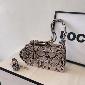 Snake skin pattern shoulder bag with transparent window and trendy knotted handle design