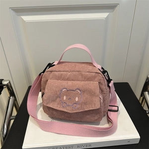 Pink corduroy crossbody messenger bag with cute bear embroidery and top handle