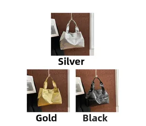 Detailed comparison of tote bags in silver, gold, and black croc embossed texture