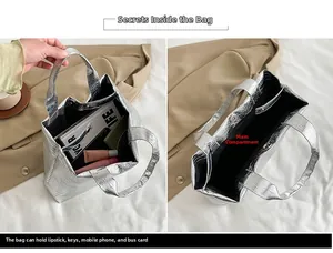 Detailed interior of silver crocodile pattern tote bag showing large main compartment