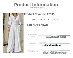 Detail view of white V-neck wide leg jumpsuit showing flattering high waist and elegant drape