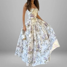 Elegant strapless floral maxi dress featuring a full flared skirt and purple print