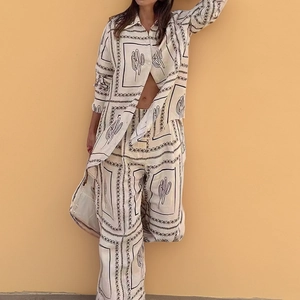 Women's casual cactus print shirt and wide-leg pants set in off-white breathable fabric