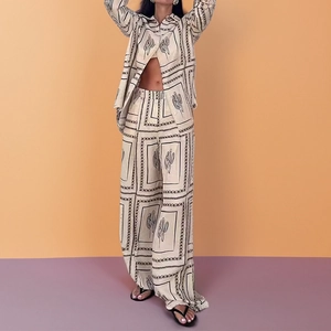 Women's 2-piece beige printed set with long sleeve shirt and wide leg trousers