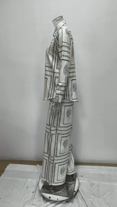 Side view of casual satin long-sleeve shirt and trousers set with cactus print