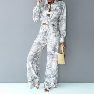 Women's two-piece set featuring Toile de Jouy print shirt and wide-leg trousers ensemble