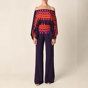 Elegant two-piece set with batwing sleeve top and wide-leg trousers in purple print