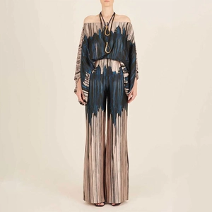Front full view of women's set featuring off-shoulder top and wide-leg trousers with abstract print