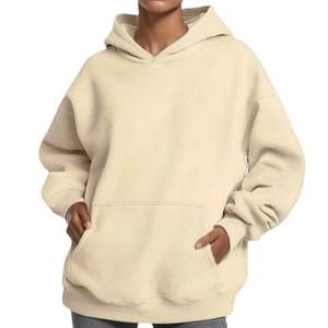 Relaxed fit cream oversized hoodie for women featuring a kangaroo pocket and drop shoulders