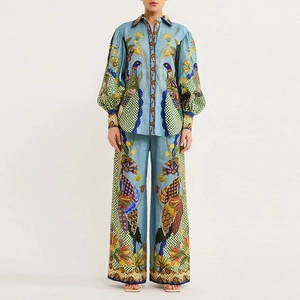 Women's 2-piece light blue floral print set with lantern sleeve shirt and wide leg pants