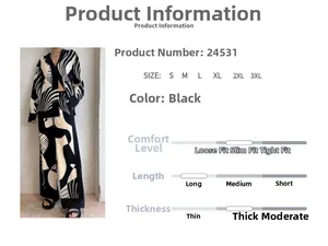 Detail view of black and white abstract wave print knit cardigan and wide leg pants set