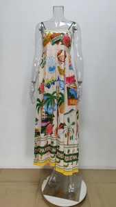 Detailed tropical print showing colorful palm trees, pineapples and nautical patterns