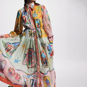 Robe vintage à manches lanternes avec imprimé artistique et ceinture tressée chic