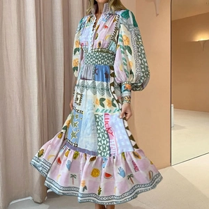Tropical print V-neck maxi dress with puff sleeves and cinched waist for spring fashion