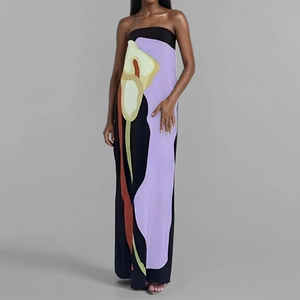 Sleeveless floral tube maxi dress with elegant calla lily print on a black slim silhouette