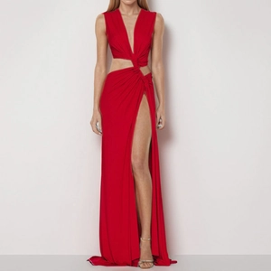 Elegant red V-neck maxi dress with waist cut-out and high slit detail for formal events