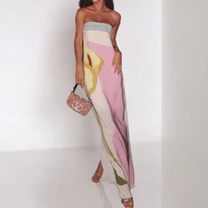 Floral strapless maxi dress with abstract print and side slit for a stylish spring look