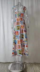 Detailed back view of a summer sundress featuring vibrant tropical and nautical patterns