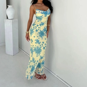 Elegant slim fit floral spaghetti strap dress in pale yellow with blue vintage patterns