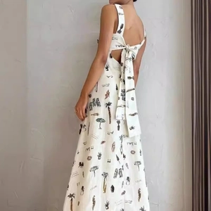 Abito estivo sexy schiena scoperta con stampa tropicale e grande fiocco sul retro