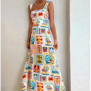 White maxi dress with colorful ocean graffiti prints and scalloped shoulder straps