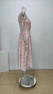 Detailed side view of pink floral satin maxi dress with spaghetti straps on a mannequin
