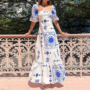Blue and white floral print maxi dress with puff sleeves and square neckline for summer