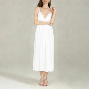 Elegant white V-neck midi dress with thin straps and high waist for a slimming fit