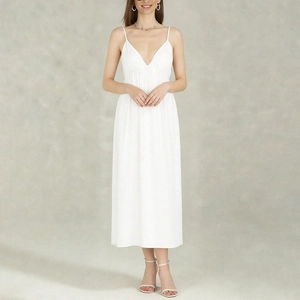 Elegant white backless V-neck maxi dress with spaghetti straps and pleated bust detail