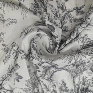Detailed macro view of Toile de Jouy print fabric with soft texture and elegant patterns
