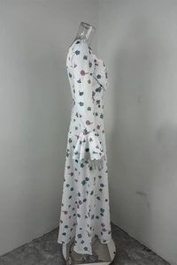 Detail of flared double-layer ruffles on floral chiffon sleeve with abstract print