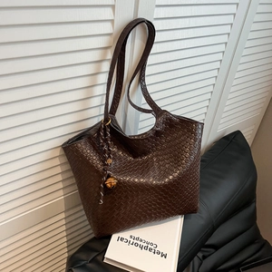 Deep brown woven tote bag for women with dual straps and side tassel decorations