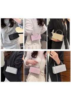 Sparkly glitter evening clutch bag shown in four colors with chain strap and metal handle