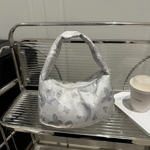 Silver butterfly jacquard hobo shoulder bag with chain detail and metallic finish