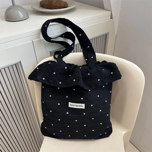 Floral black mesh tote bag with ruffle trim and textured bubble gauze fabric for summer