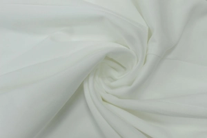 Detail shot of elegant white twill fabric texture with soft drapery and premium finish
