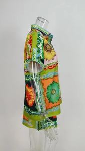 Detail of sunflower and baroque print on lightweight two-piece shirt and shorts set